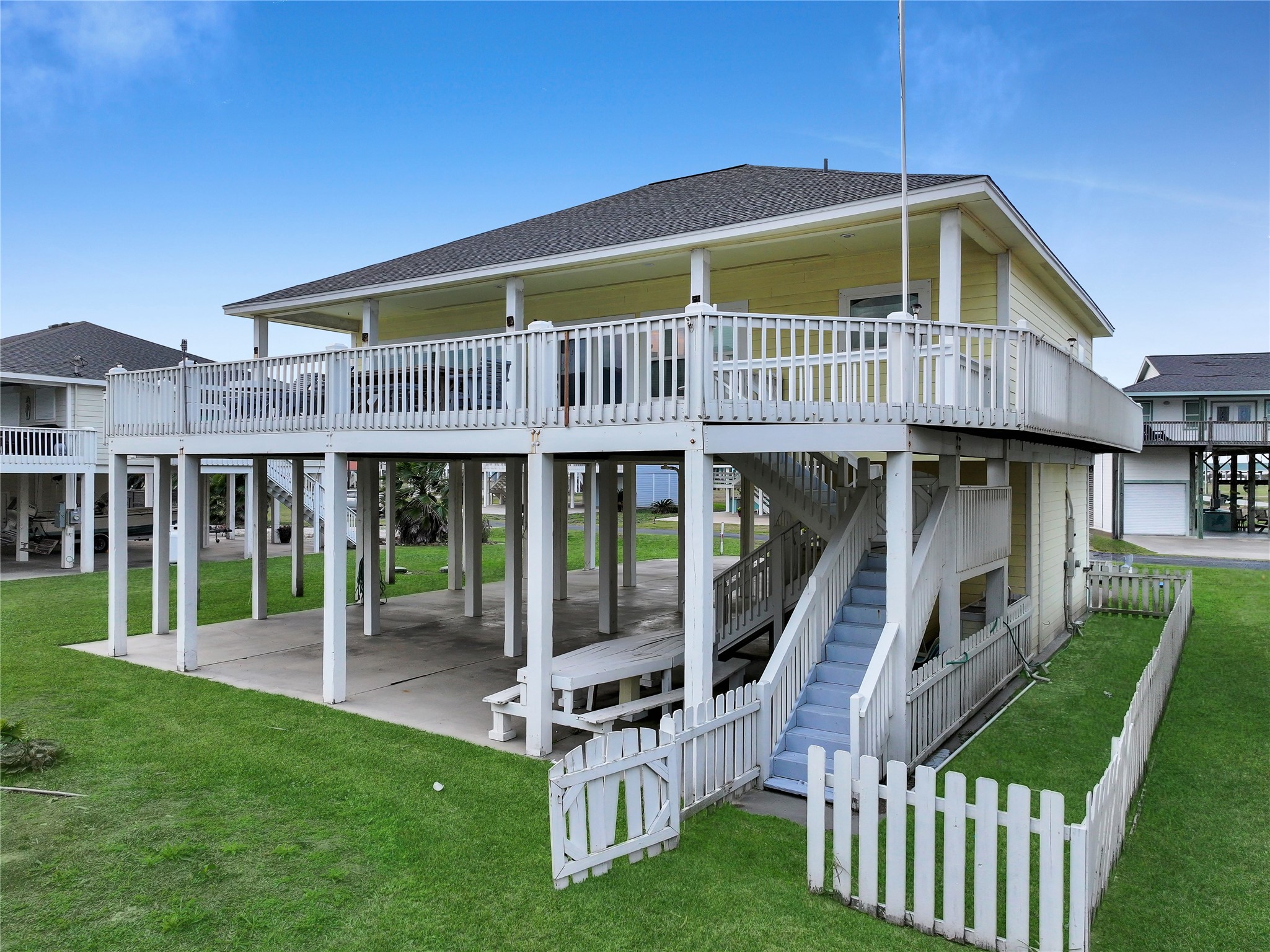 2296 Martinique Crystal Beach, TX 77650 - Photo 46 of 49 a front view of house with yard slide and furniture