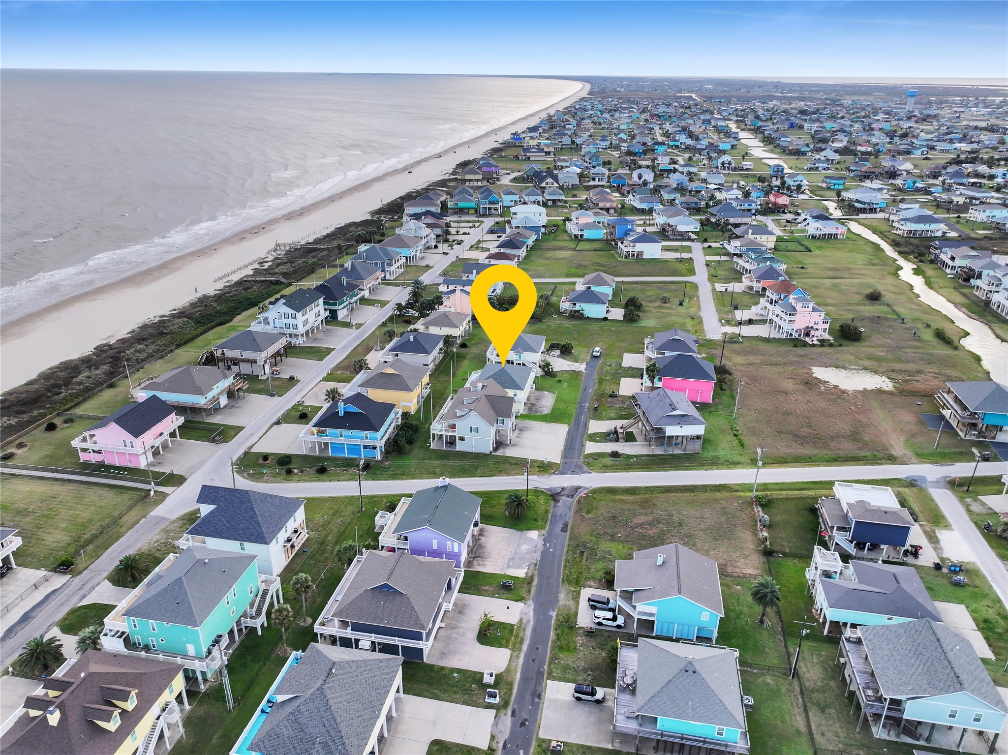 2296 Martinique Crystal Beach, TX 77650 - Photo 48 of 49 a view of swimming pool with a patio and a garden