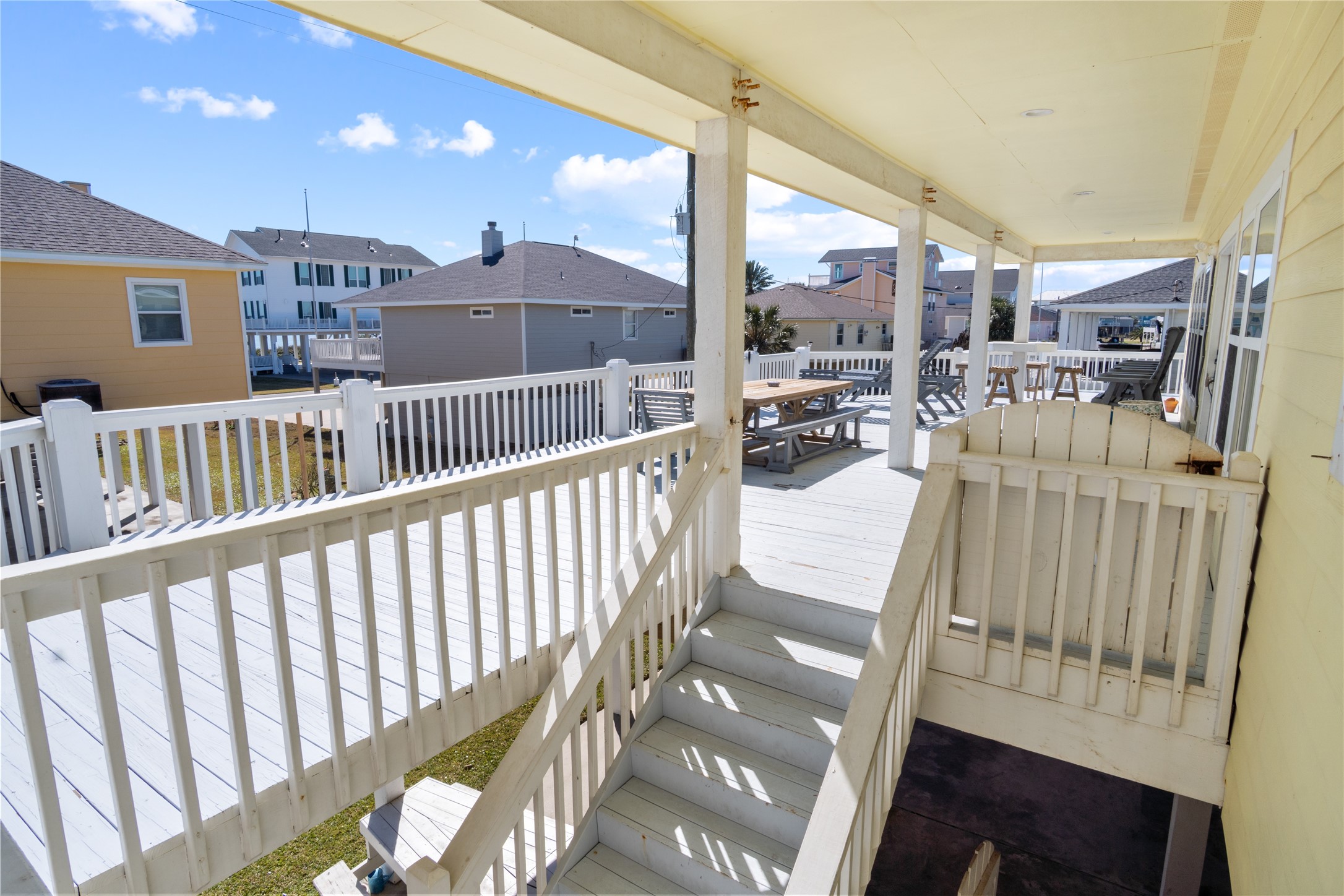 2296 Martinique Crystal Beach, TX 77650 - Photo 5 of 49 a view of a balcony with furniture