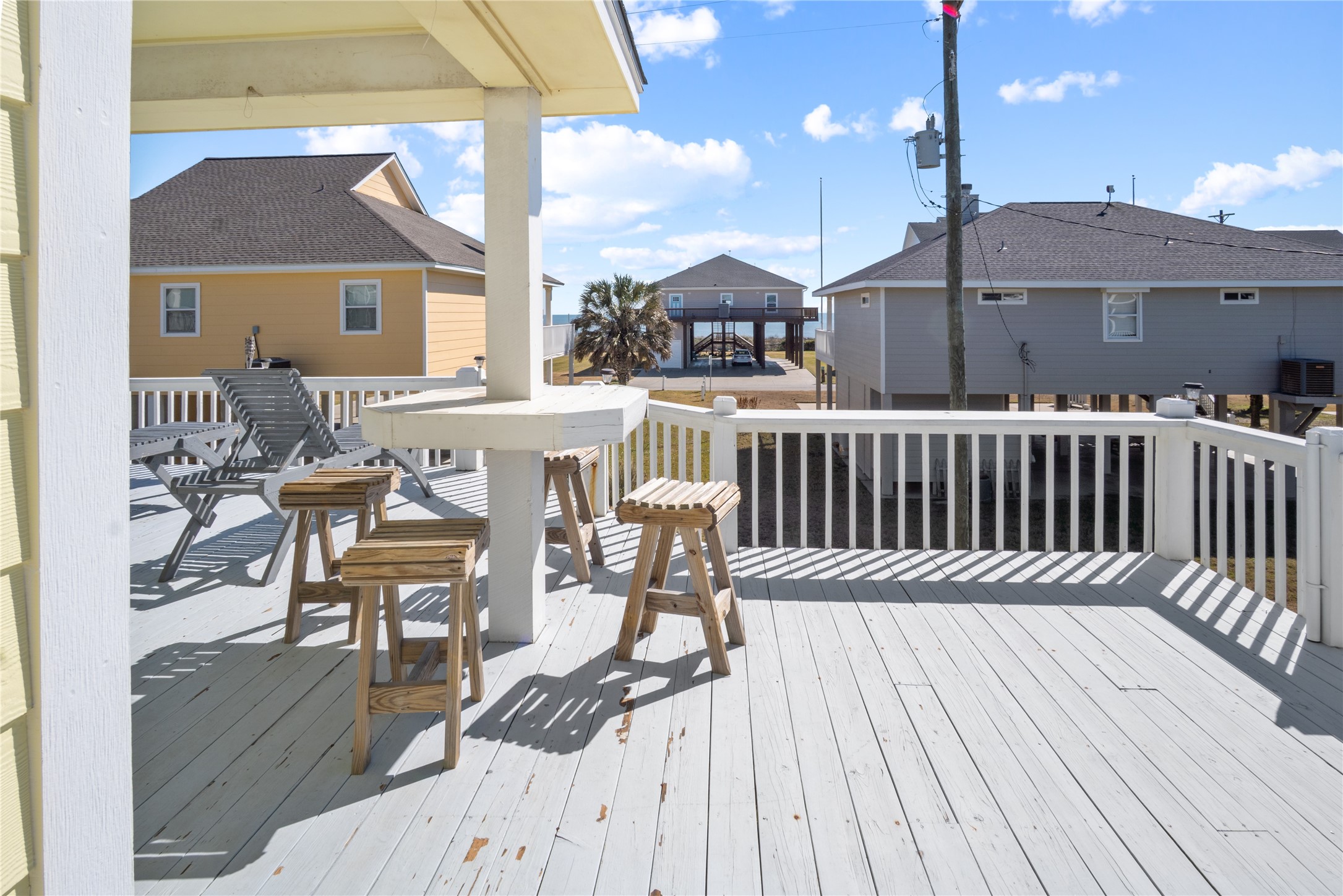 2296 Martinique Crystal Beach, TX 77650 - Photo 7 of 49 a view of a patio with a table and chairs