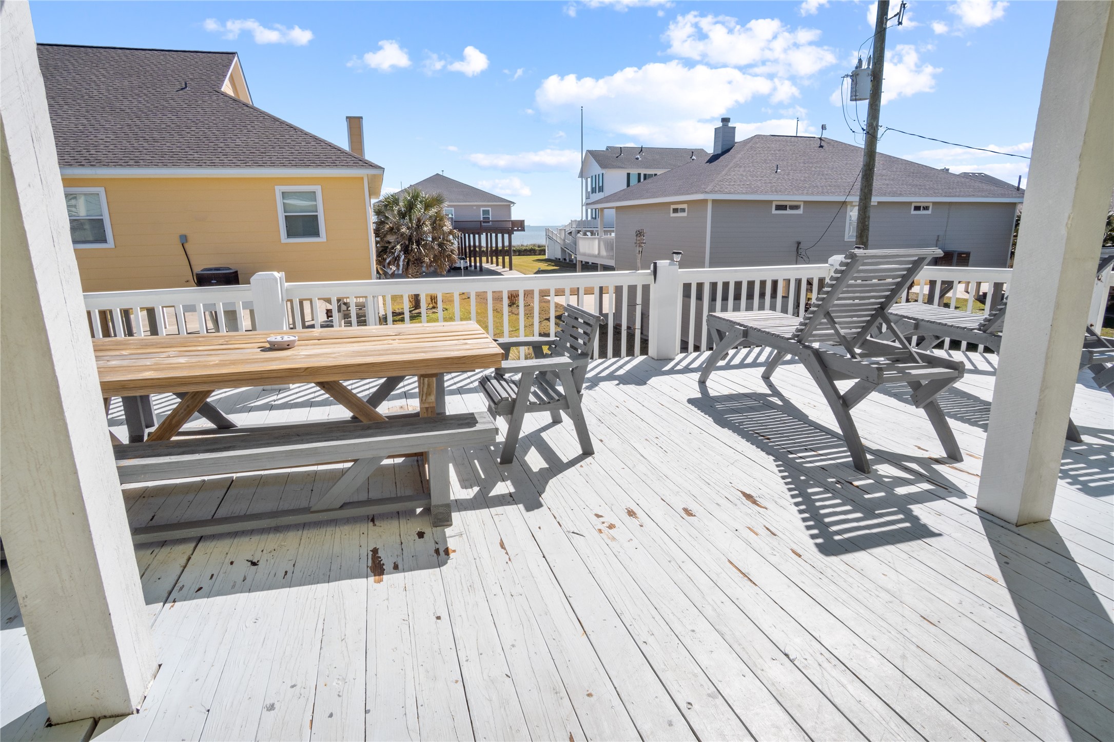 2296 Martinique Crystal Beach, TX 77650 - Photo 8 of 49 a view of a balcony with furniture