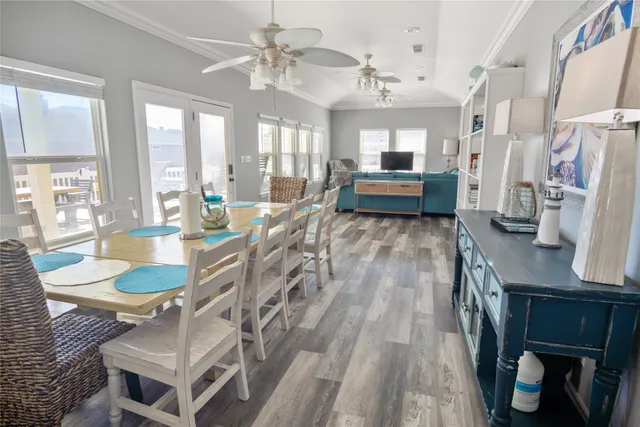 a living room with furniture a fireplace and a table