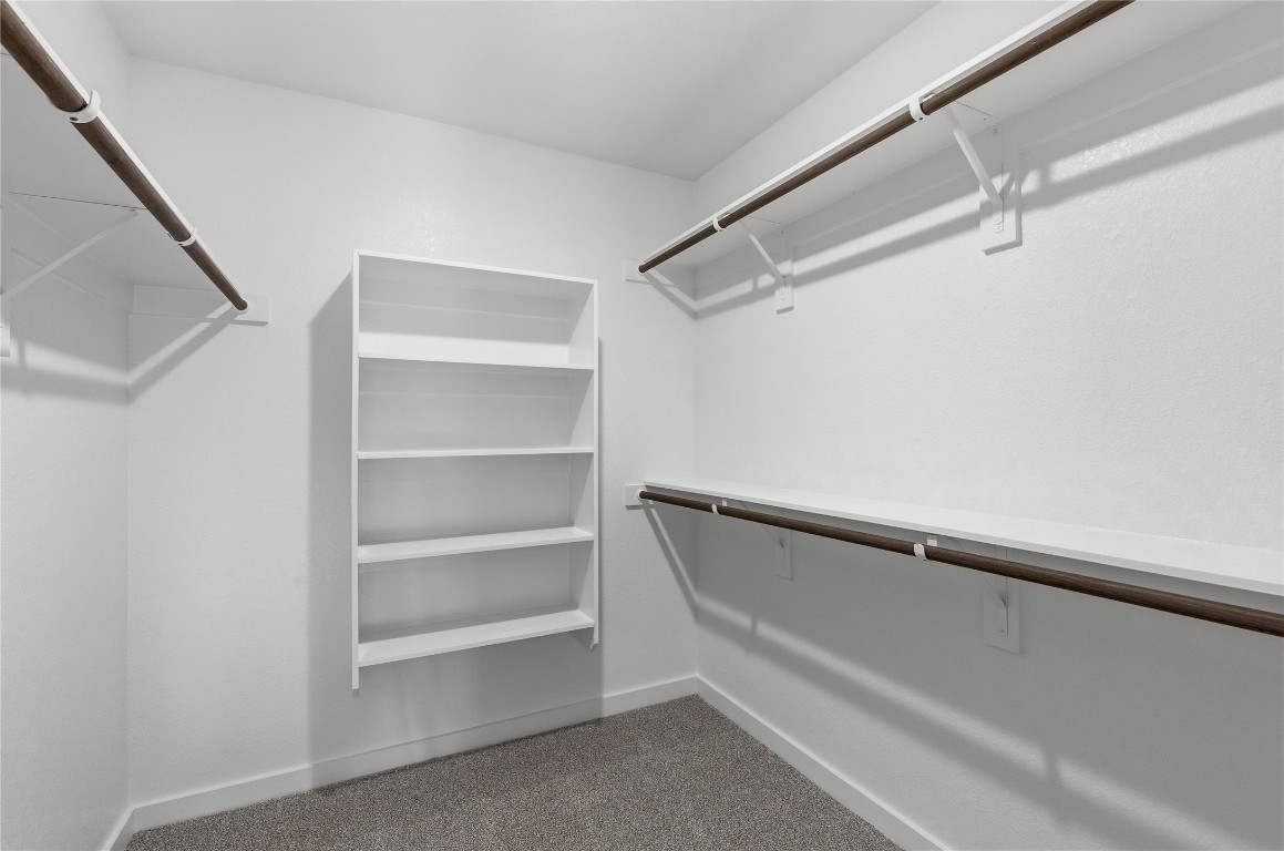 350 Mustang Bend Kyle, TX 78640 - Photo 11 of 18 Spacious closet with light colored carpet