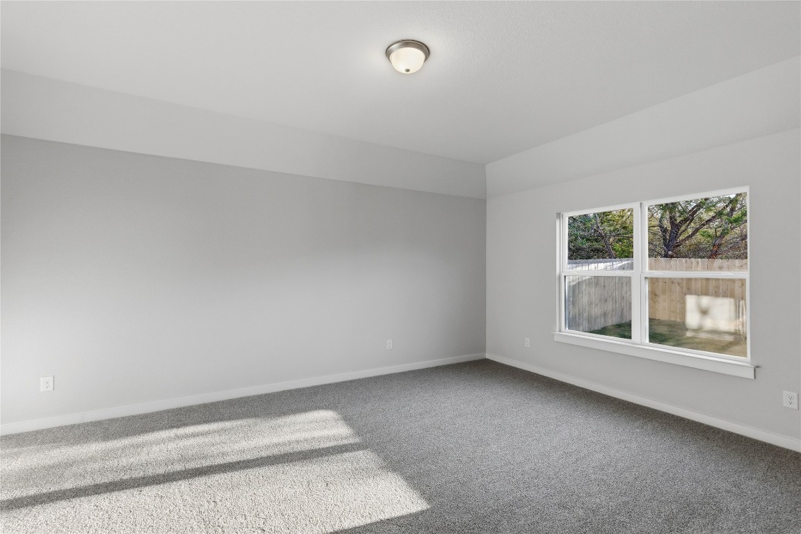 350 Mustang Bend Kyle, TX 78640 - Photo 9 of 18 Spare room with carpet and baseboards