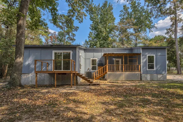 a view of a yard with trees