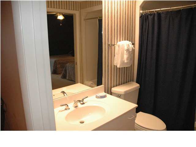 10254 East Hwy Inlet Beach, Unit 13W 30A Inlet Beach, FL 32461 - Photo 10 of 16 a bathroom with a sink and a mirror