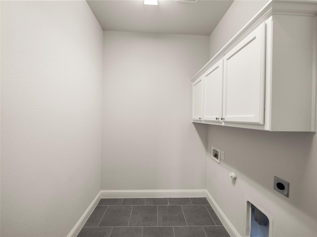 3044 Bold Ruler Road Celina, TX 75009 - Photo 21 of 36 a view of storage and utility room with closet