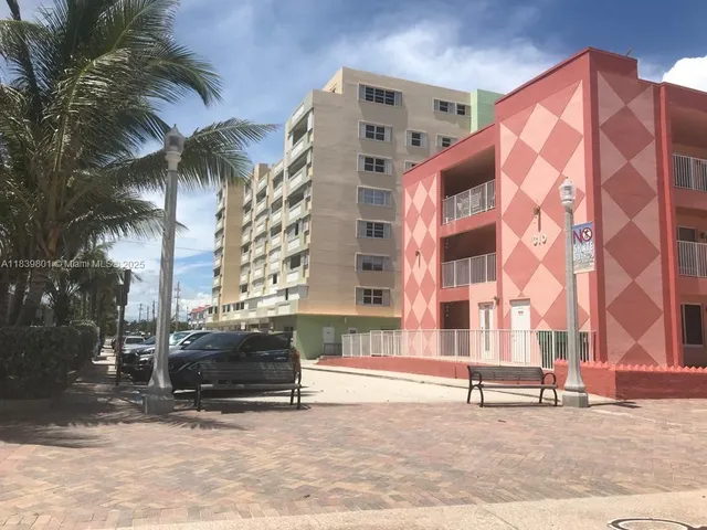 a view of tall buildings with a terrace