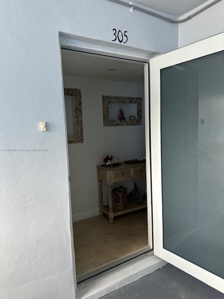 320 South Surf Road, Unit 305 Hollywood, FL 33019 - Photo 2 of 32 a room with storage and utility