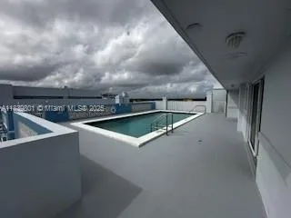 a view of a terrace with furniture