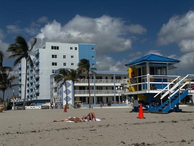 320 South Surf Road, Unit 305 Hollywood, FL 33019 - Photo 31 of 32 a front view of a building with streets and trees
