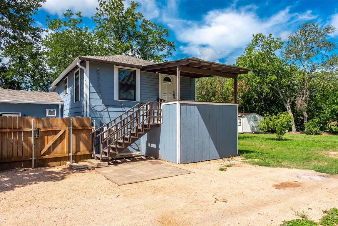 406 Lexington Road, Unit B Elgin, TX 78621 - Photo 20 of 21 a view of a house with yard and sitting area