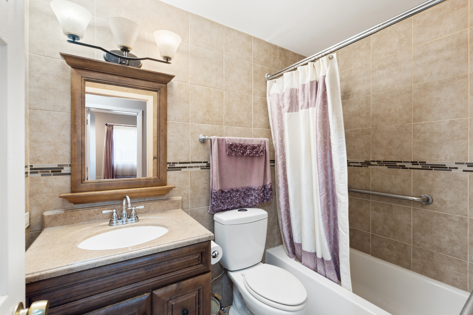 111 Deerpath Road Matteson, IL 60443 - Photo 15 of 23 a bathroom with a sink a toilet and shower