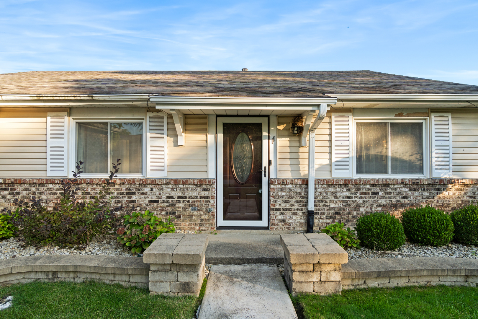111 Deerpath Road Matteson, IL 60443 - Photo 2 of 23 a front view of a house with a garden