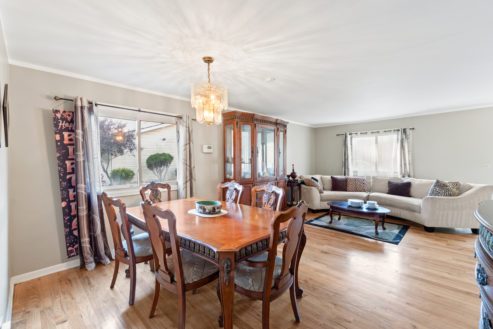 111 Deerpath Road Matteson, IL 60443 - Photo 6 of 23 a view of a dining room with furniture window and wooden floor
