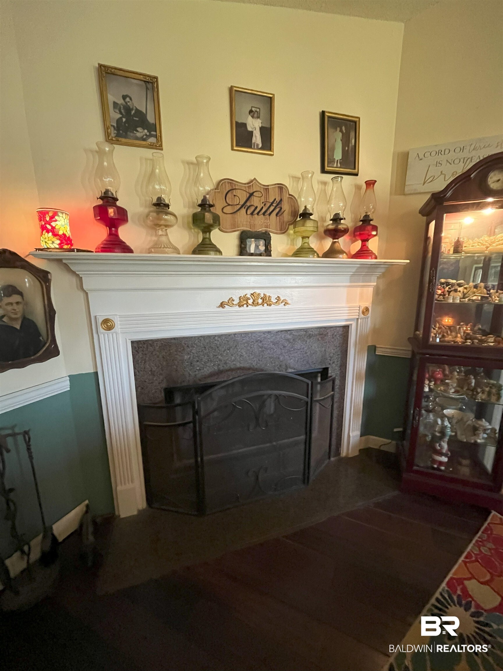 7851 Highway 98 Fairhope, AL 36532 - Photo 9 of 40 Detailed view of a fireplace and wood finished floors