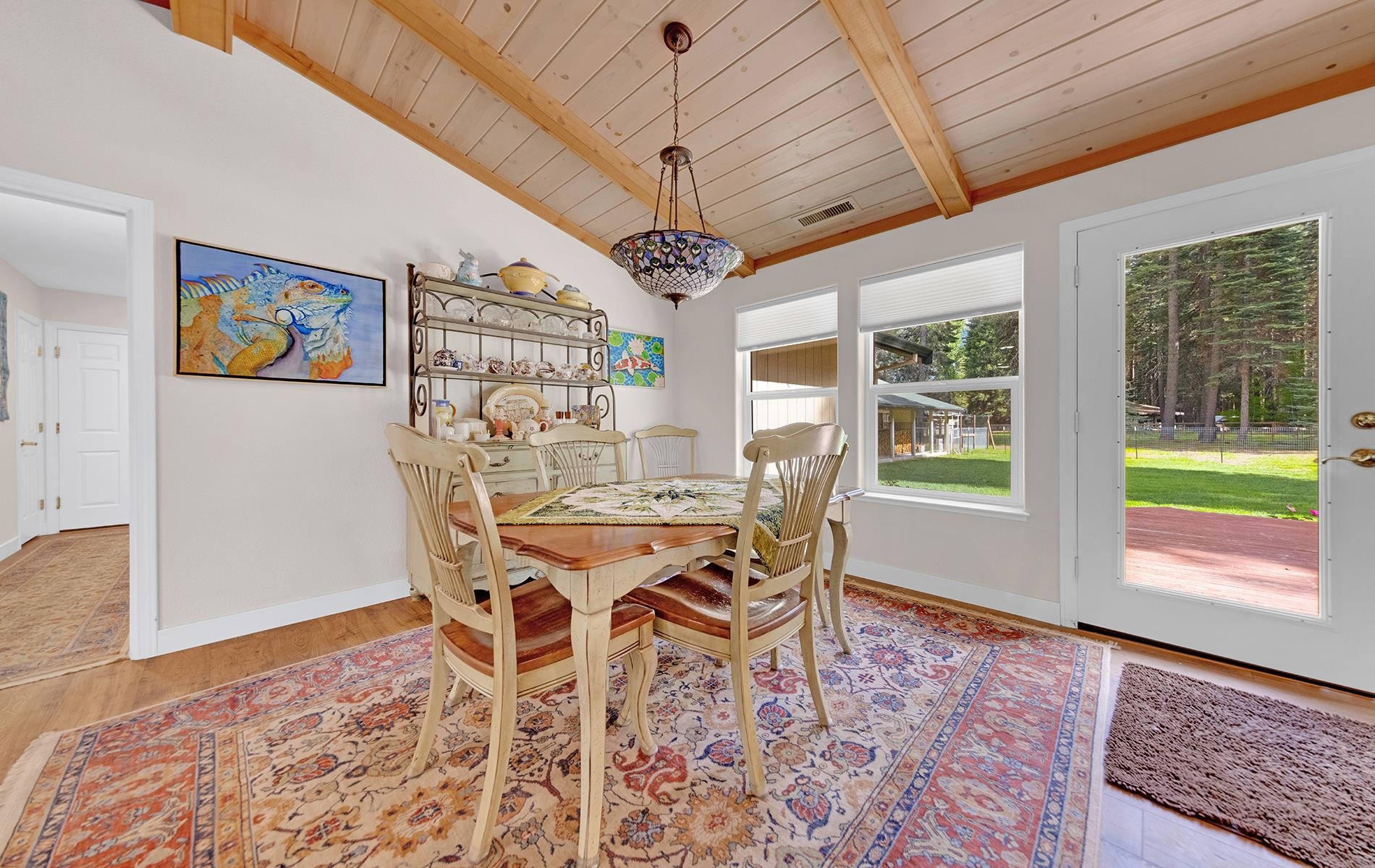 650 Wagon Road Chester, CA 96020 - Photo 7 of 36 a view of a dining room with furniture window and wooden floor