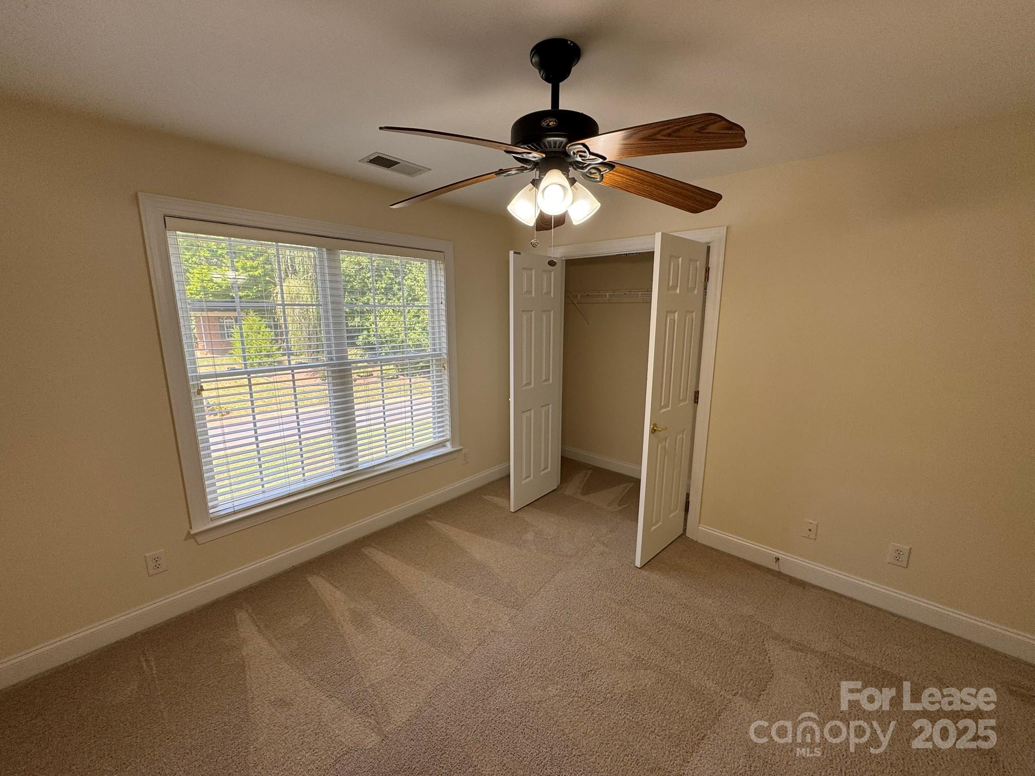 7127 Weddington Brook Drive Matthews, NC 28104 - Photo 21 of 31 a view of an empty room with a window