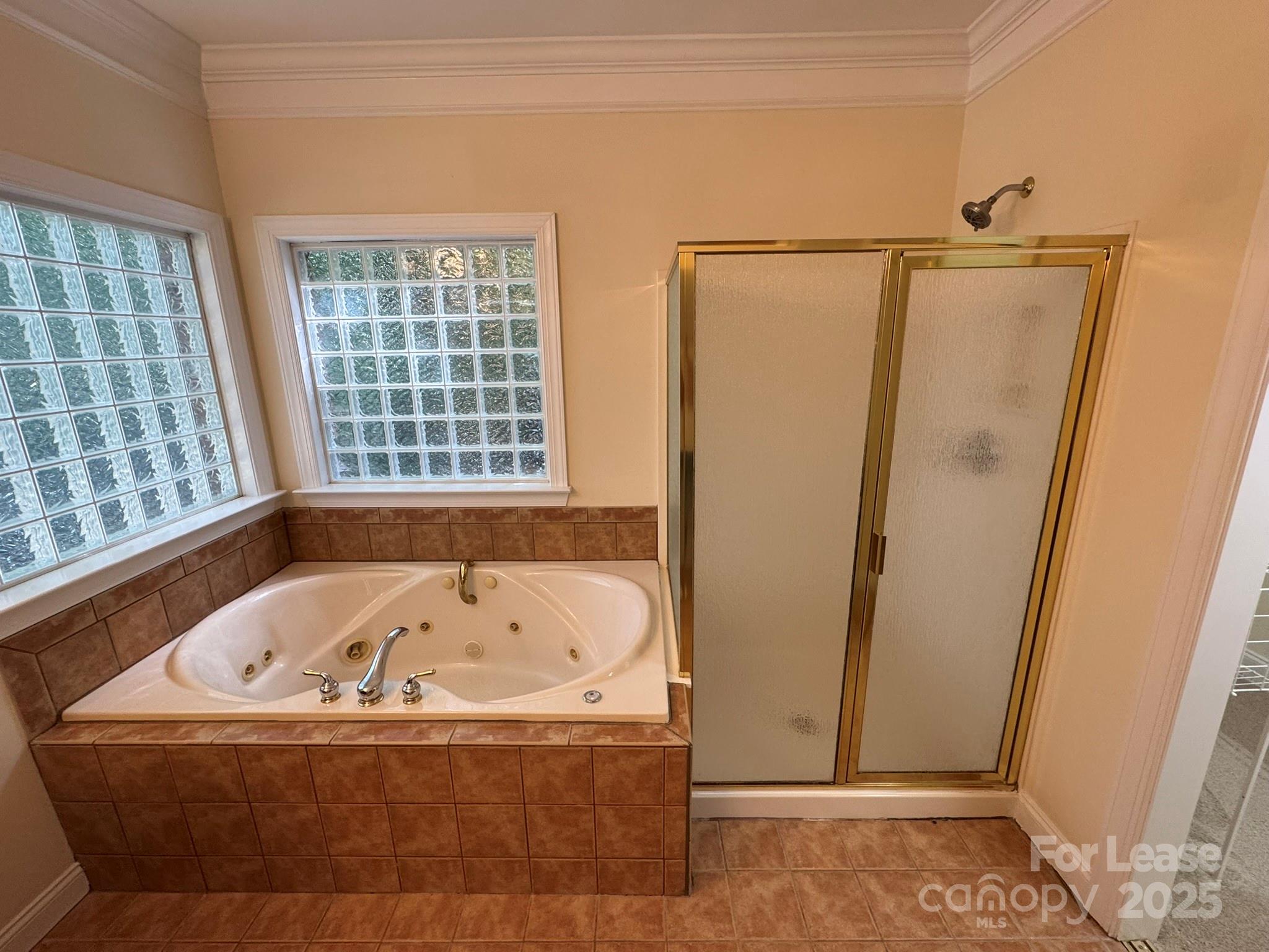 7127 Weddington Brook Drive Matthews, NC 28104 - Photo 26 of 31 a bath tub sitting next to a window