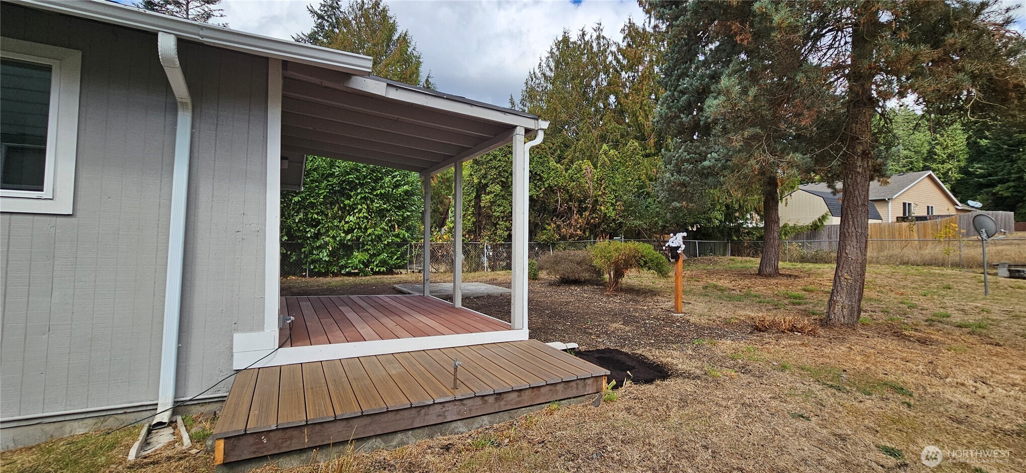 7606 Union Mills Road Southeast Lacey, WA 98503 - Photo 16 of 16 a view of backyard with small cabin