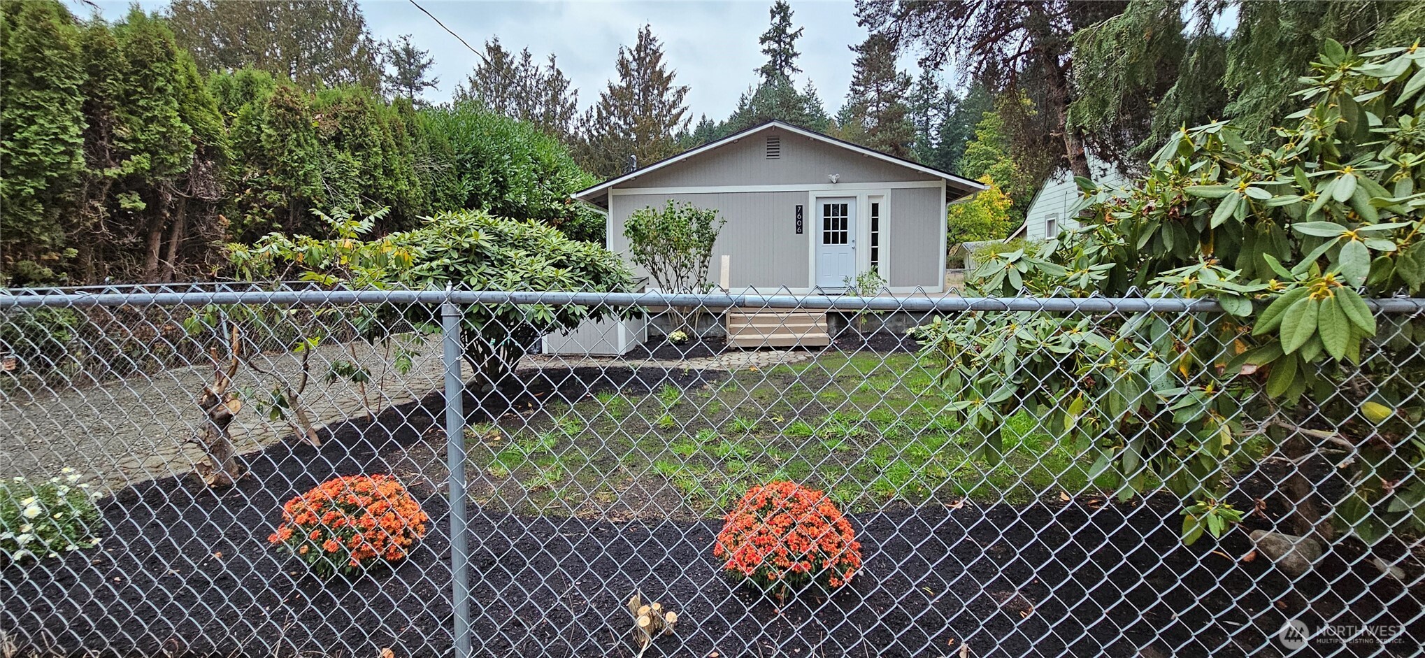 7606 Union Mills Road Southeast Lacey, WA 98503 - Photo 2 of 16 a view of outdoor space and yard