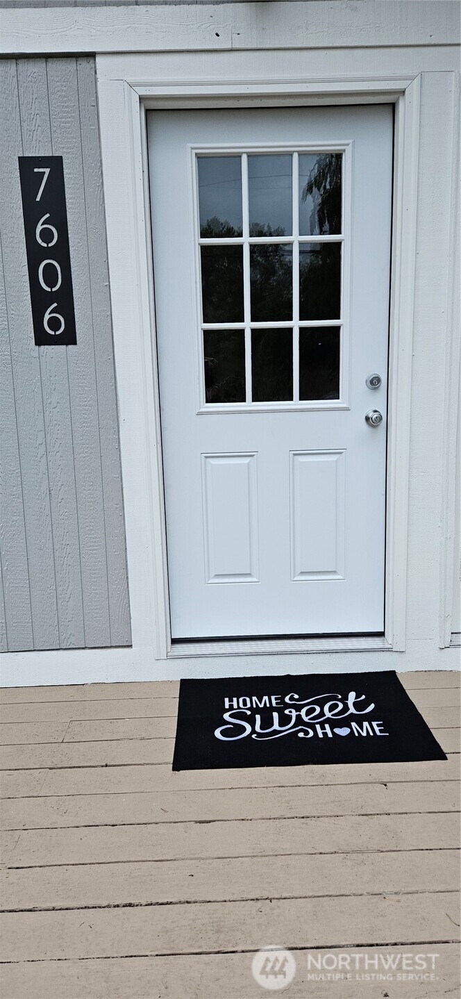 7606 Union Mills Road Southeast Lacey, WA 98503 - Photo 3 of 16 a view of a dresser