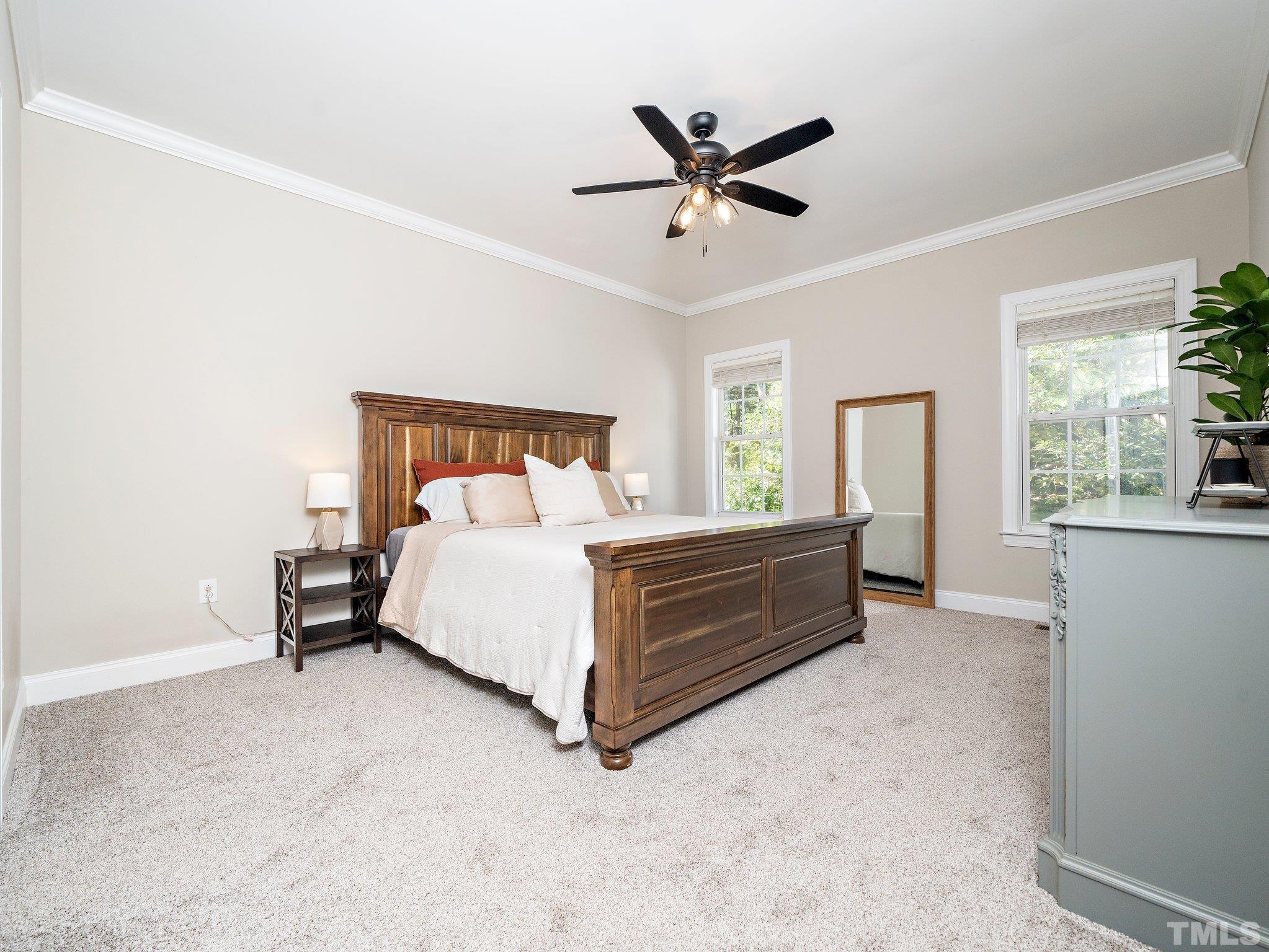 1236 Torchlight Way Raleigh, NC 27603 - Photo 16 of 39 a bed room with a bed and a window