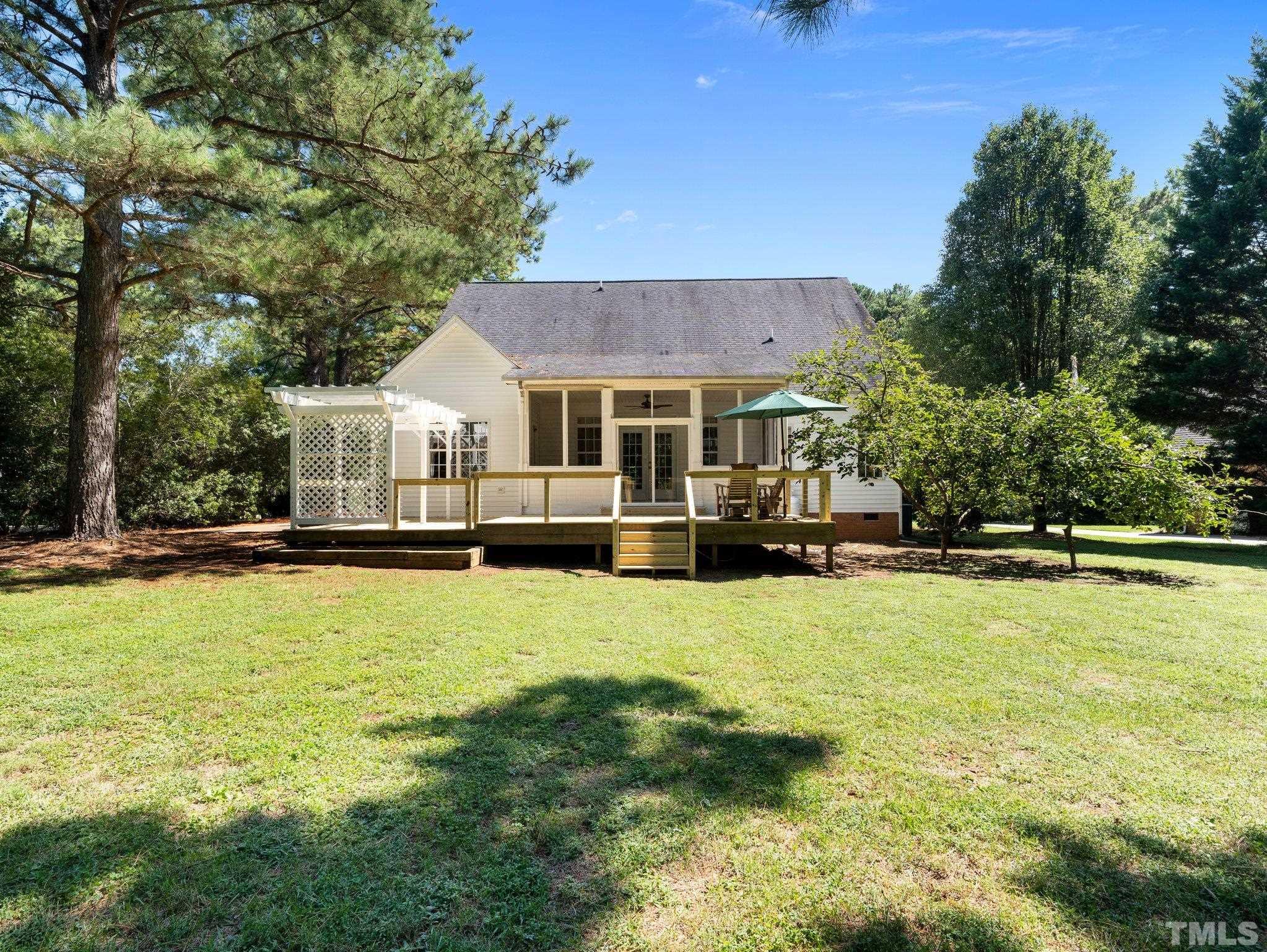 1236 Torchlight Way Raleigh, NC 27603 - Photo 29 of 39 a swimming pool view with a seating space