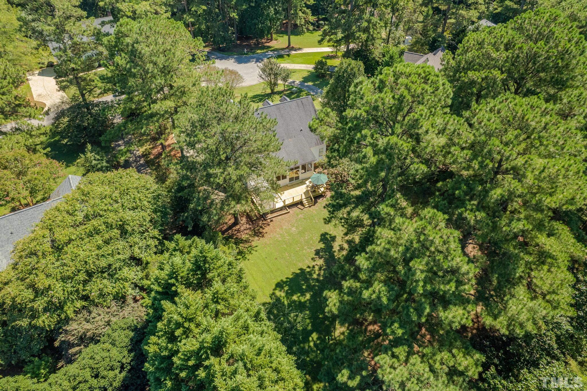 1236 Torchlight Way Raleigh, NC 27603 - Photo 33 of 39 a view of a lake view with houses in back