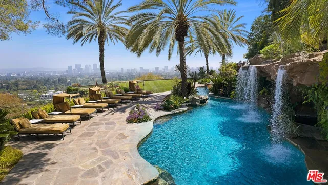 a view of a wooden table with chairs