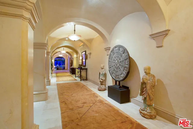 a view of a patio with a table and chairs