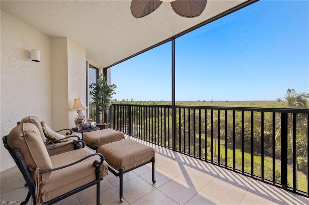 1065 Borghese Lane, Unit 403 Naples, FL 34114 - Photo 23 of 30 a view of balcony with furniture