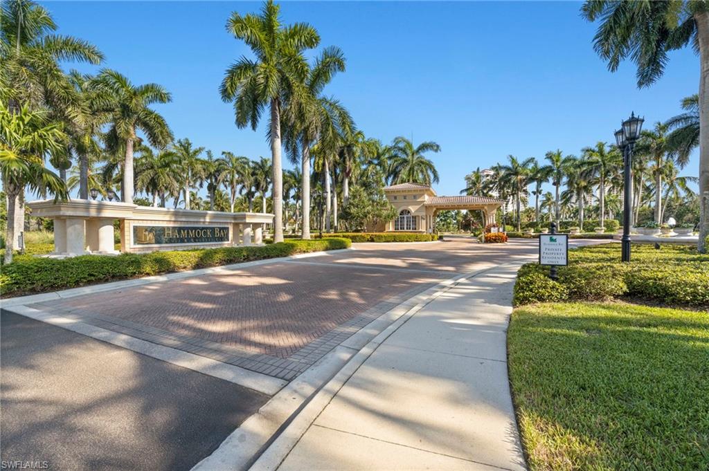 1065 Borghese Lane, Unit 403 Naples, FL 34114 - Photo 25 of 30 a view of a street with palm trees