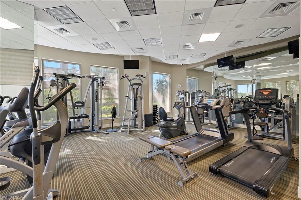 1065 Borghese Lane, Unit 403 Naples, FL 34114 - Photo 30 of 30 a view of a room with gym equipment
