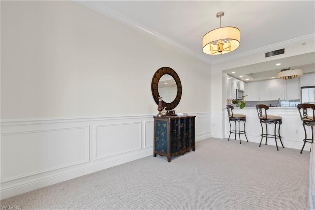 1065 Borghese Lane, Unit 403 Naples, FL 34114 - Photo 7 of 30 a view of a kitchen
