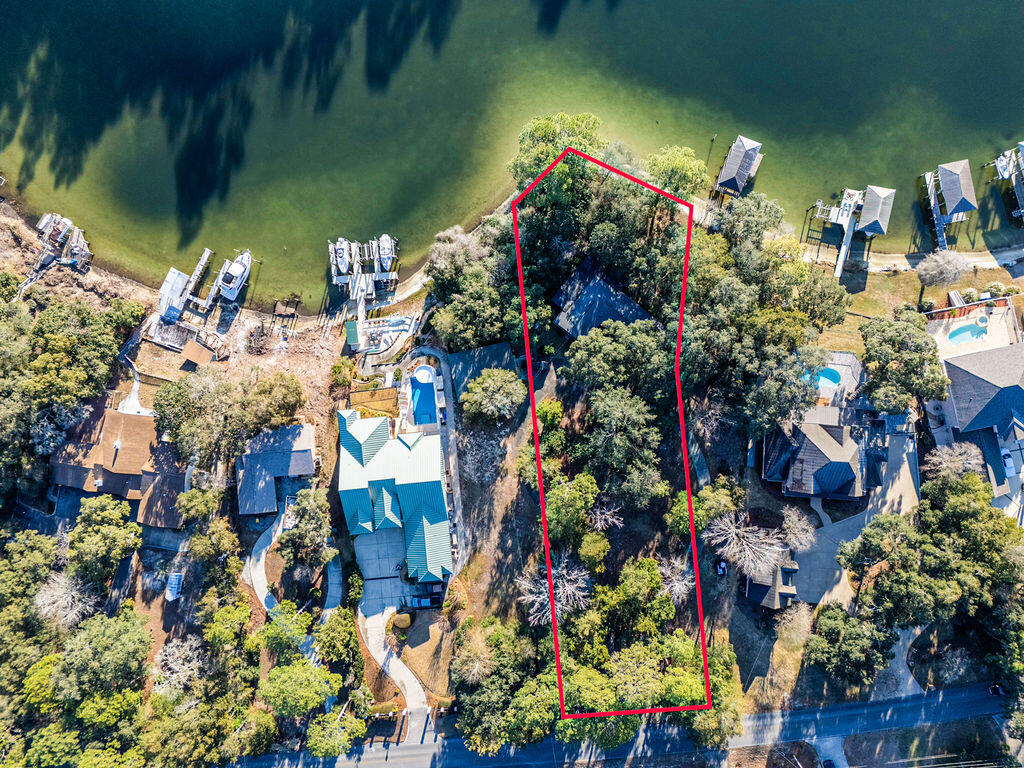 15 Poquito Road Shalimar, FL 32579 - Photo 3 of 7 a view of a flowers in a yard