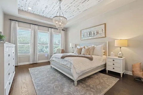 a view of a room with furniture window and wooden floor