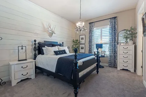 a bathroom with a granite countertop sink a toilet and bathtub