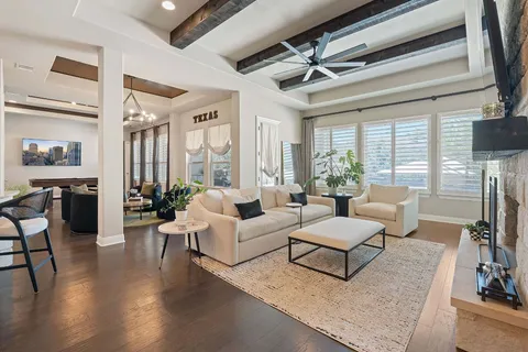 a kitchen with granite countertop cabinets and refrigerator