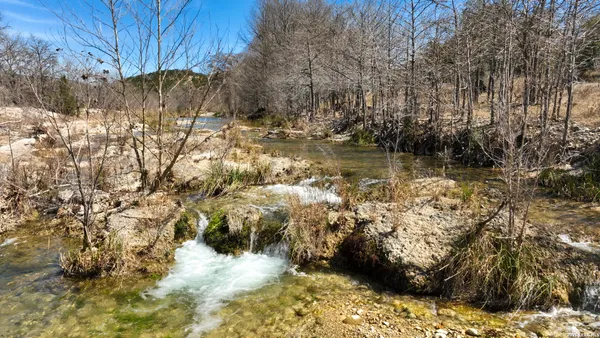 a view of yard covered with snow