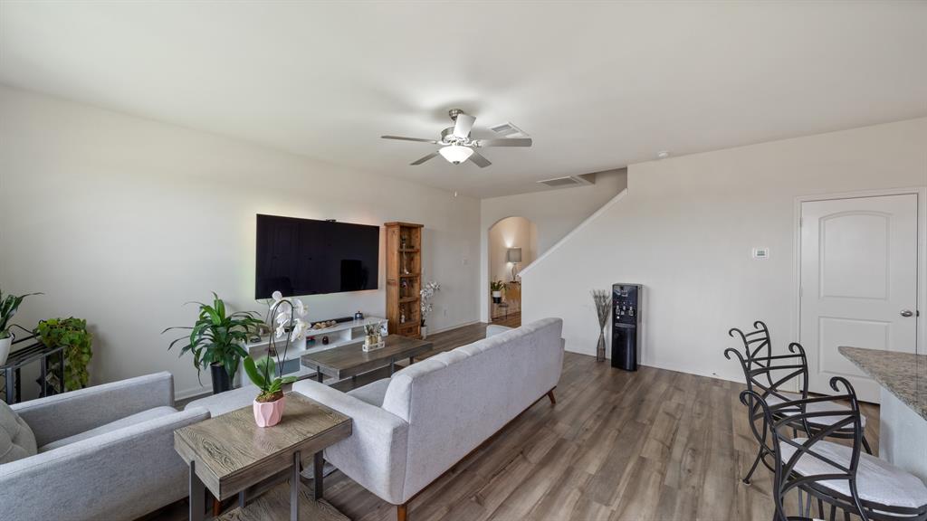 408 Micah Lane Ferris, TX 75125 - Photo 4 of 19 a living room with furniture and a flat screen tv