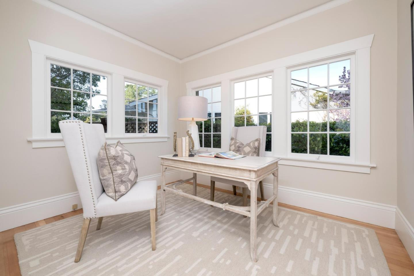 344 Occidental Avenue Burlingame, CA 94010 - Photo 14 of 27 a living room with furniture and a window