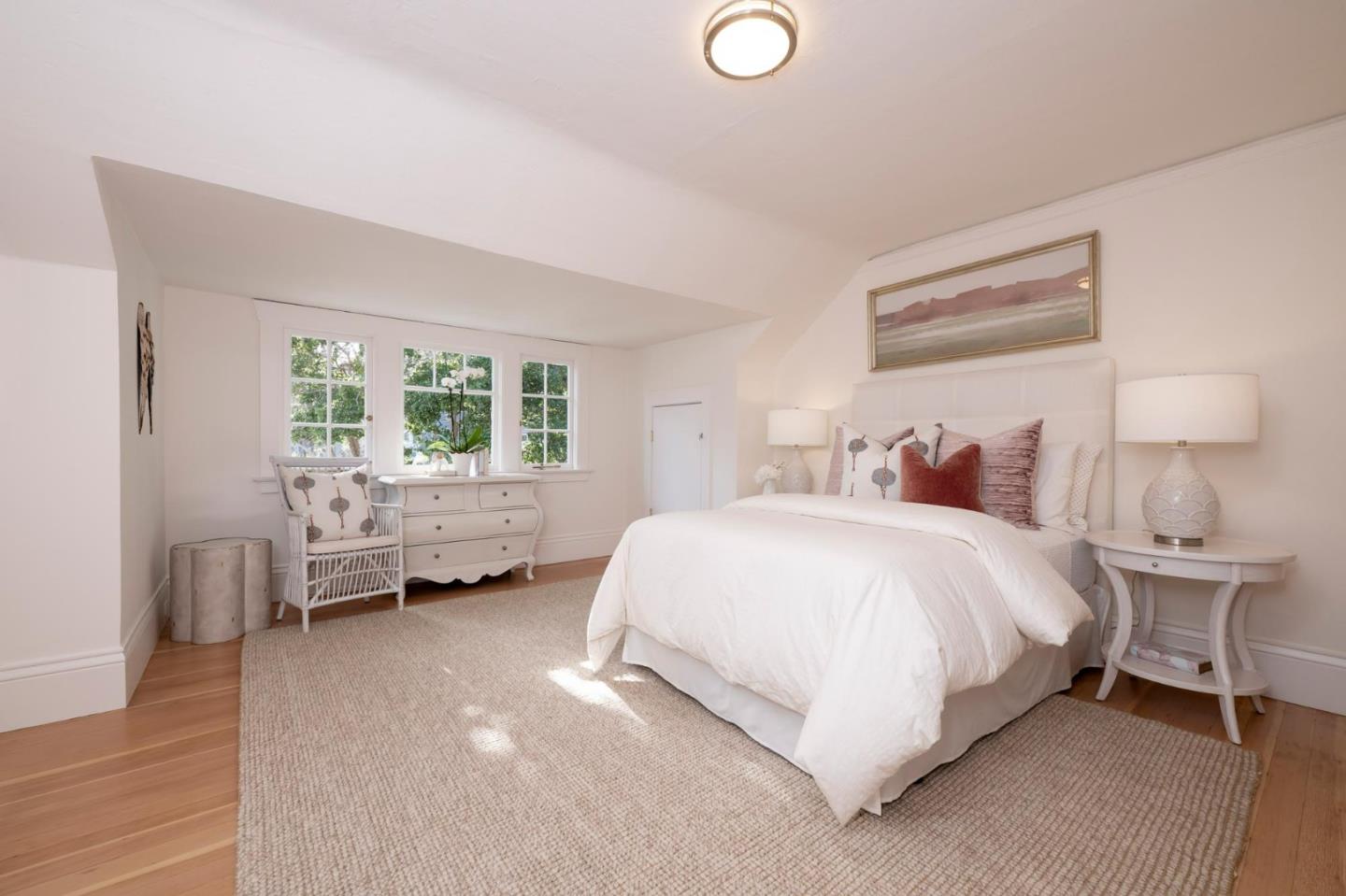 344 Occidental Avenue Burlingame, CA 94010 - Photo 16 of 27 a spacious bedroom with a bed and a window