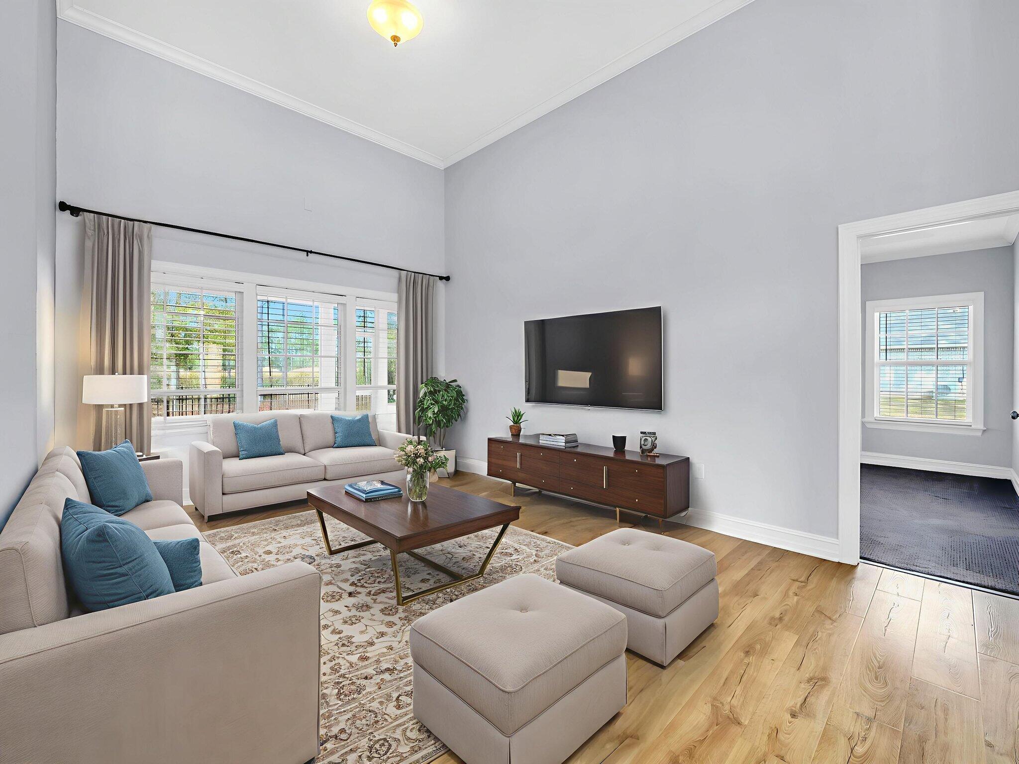 180 Gulf Pines Court Freeport, FL 32439 - Photo 13 of 70 a living room with furniture and a flat screen tv