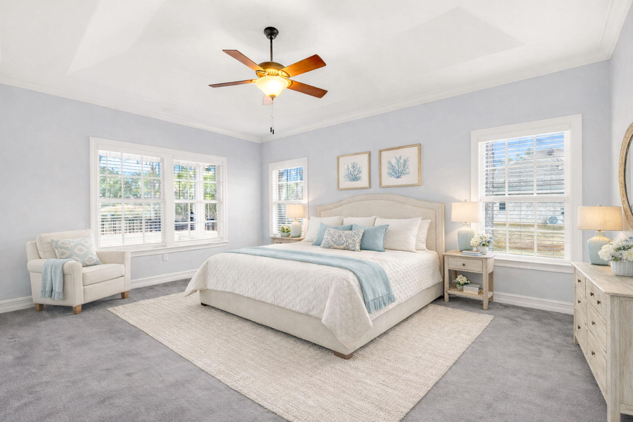 180 Gulf Pines Court Freeport, FL 32439 - Photo 19 of 70 a spacious bedroom with a large bed and a window