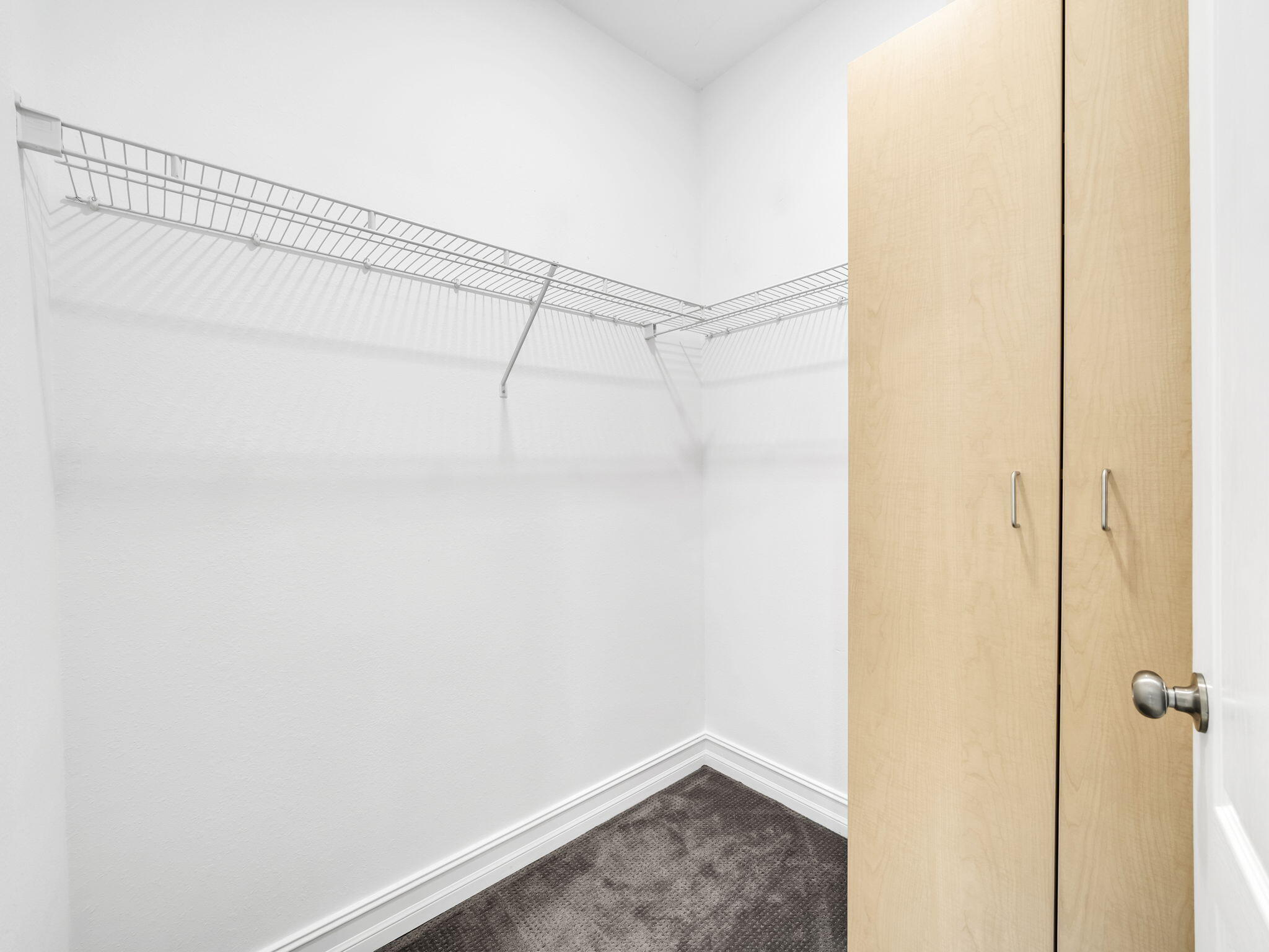 180 Gulf Pines Court Freeport, FL 32439 - Photo 26 of 70 a view of a room with racks on the wall