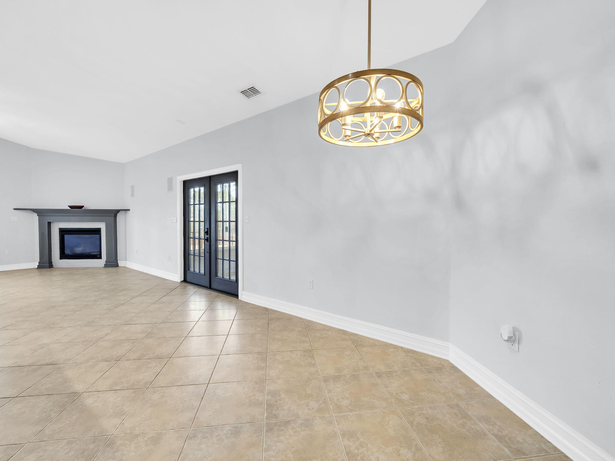 180 Gulf Pines Court Freeport, FL 32439 - Photo 28 of 70 an empty room with a window