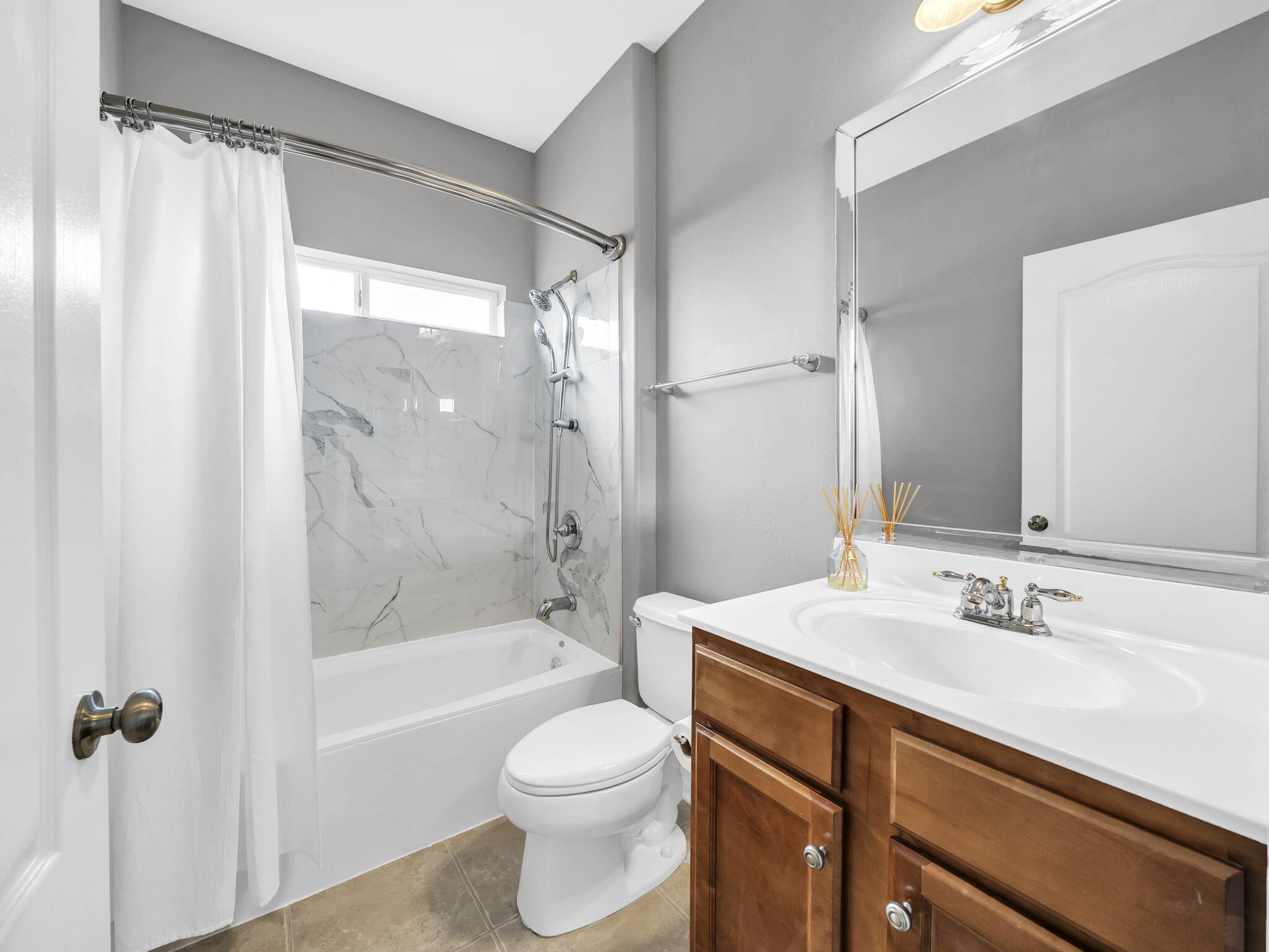 180 Gulf Pines Court Freeport, FL 32439 - Photo 42 of 70 a bathroom with a sink a toilet and shower