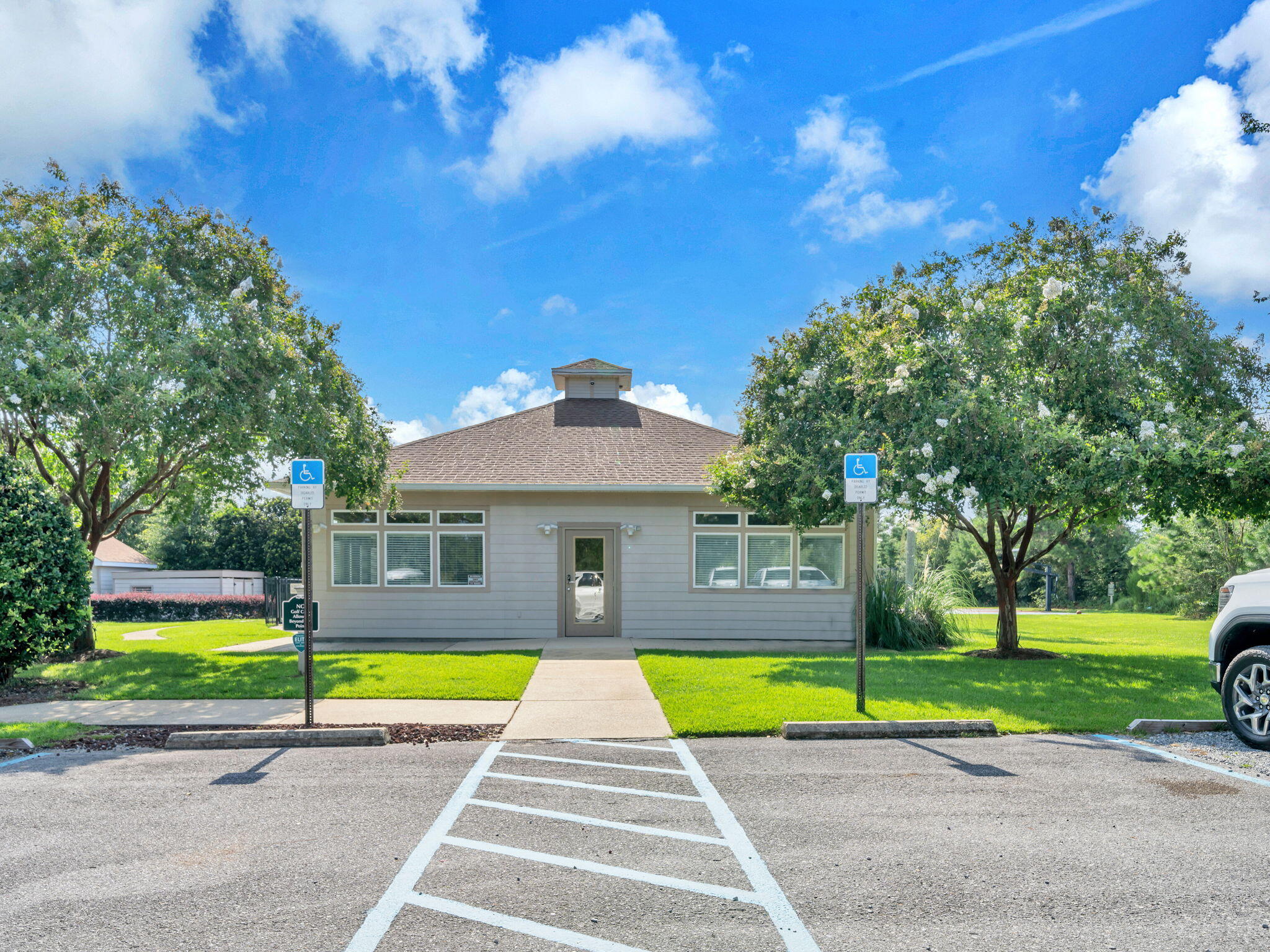 180 Gulf Pines Court Freeport, FL 32439 - Photo 64 of 70 a view of outdoor space yard and swimming pool