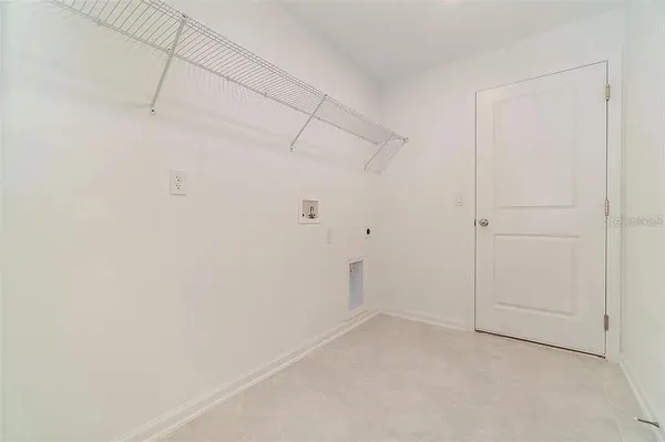 a view of a room with racks on the wall
